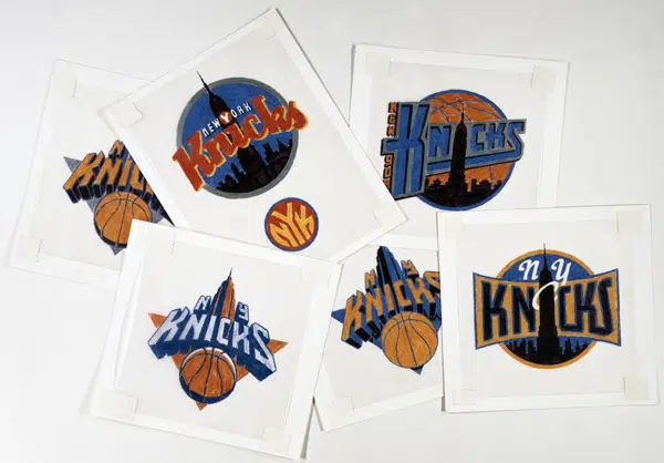 Derrière le logo des Knicks avec Michael Doret